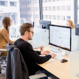 HealthVerity team members working at their computers